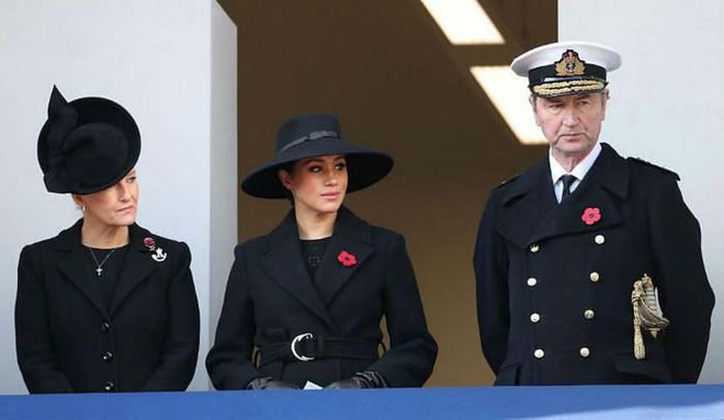 Meghan Markle stands on a balcony at the Cenotaph with Prince Edward's wife, Sophie, and Princess Anne's husband, Timothy.

Photo: Getty