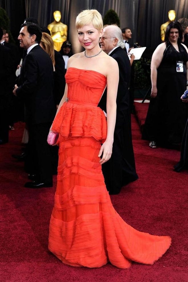 Nominated for Best Actress for My Week With Marilyn, Michelle Williams brought the peplum back in this red tulle Louis Vuitton gown and matching lip.