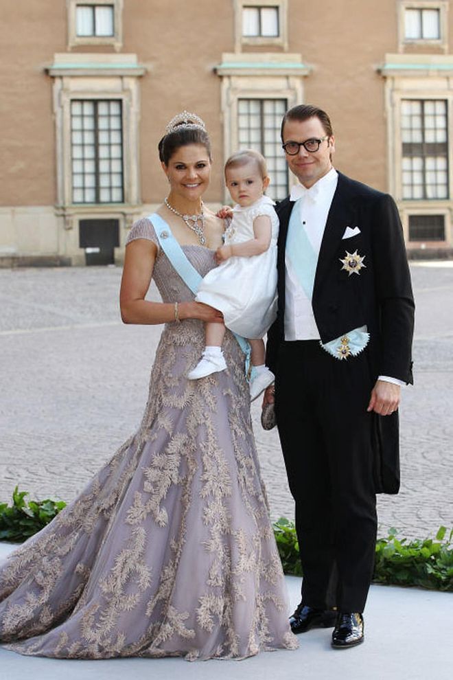 Here she is at the wedding of her sister Princess Madeleine, in Fadi El Khoury Couture, with her husband and son.