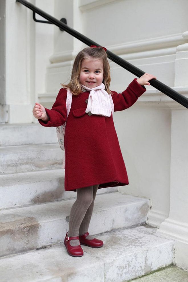 In honor of Princess Charlotte's first day of nursery school, Kensington Palace shared two adorable photos of the little royal captured by the Duchess of Cambridge. The two-year-old was all smiles in a red coat, matching Mary Janes, and pink scarf as she headed off to her big day. Many royal fans also couldn't get over how much Princess Charlotte resembled a young Queen Elizabeth and Princess Diana in the photos.