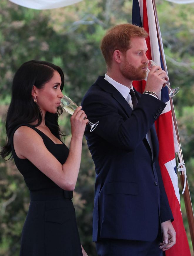 The pair drank champagne as they made a toast to their host.

Photo: Getty