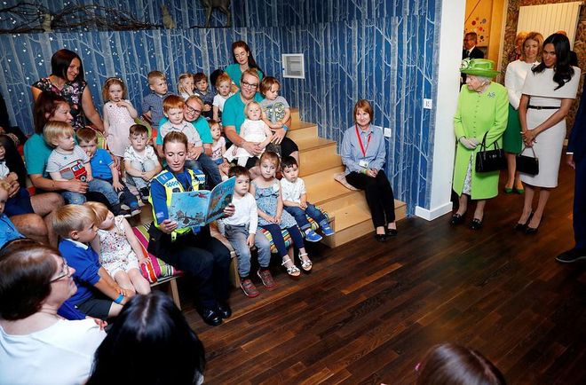 The royals peek in on story time at Storyhouse. Photo: Getty