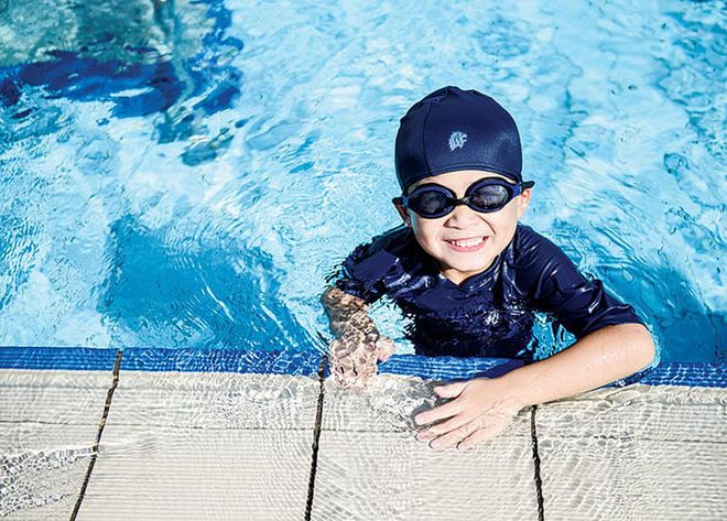 Kids enjoy after-school enrichment activities such as swimming at the Early Learning Village.