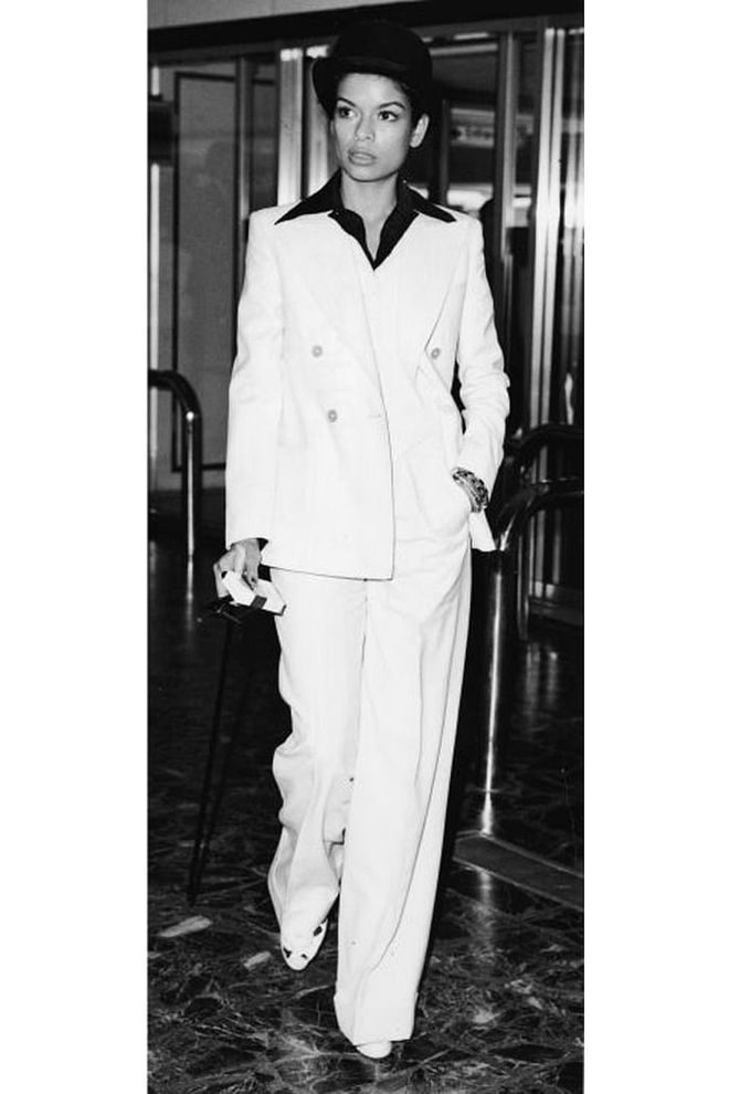 Part of the high-glam '70s and a staple of Studio 54, Bianca Jagger had a style all her own. She favored sequined sheaths, fur, high-waisted pants, crisp suits, and blouses that were unbuttoned as could be. She mixed and matched old pieces with the new (think wide-legged pants with a revealing top, turban, and sleek, black choker) in a way that was thoroughly modern and entirely rock and roll.