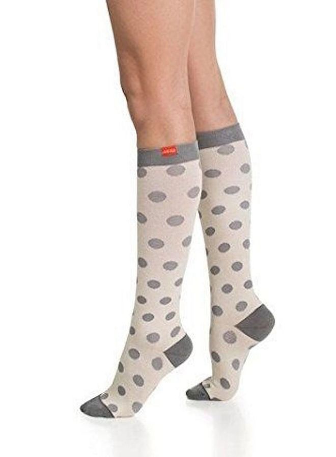 If deep-vein thrombosis is a concern for you on long-haul flights consider wearing compression socks or tights. They even come in fun patterns now, so there's really no excuse.