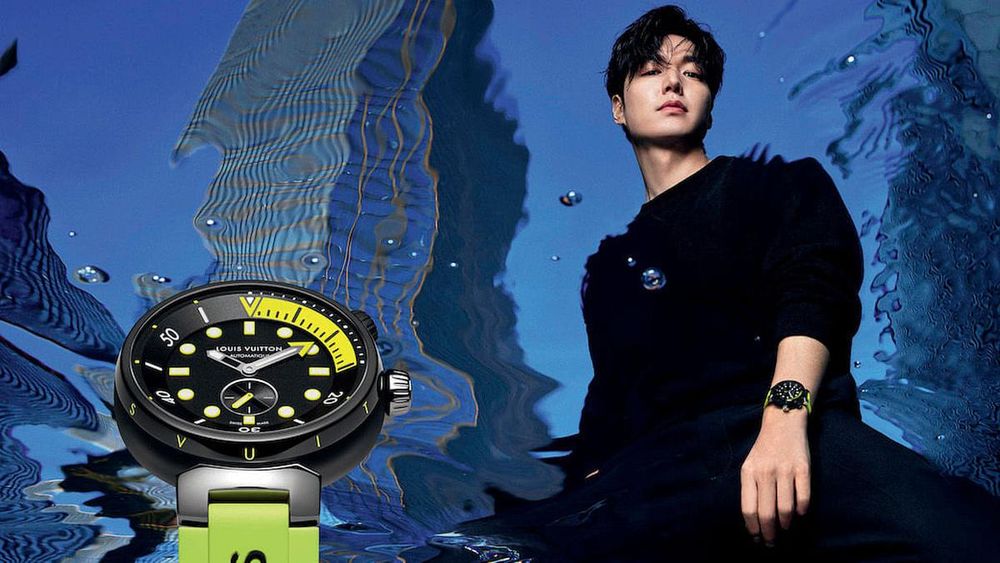 South Korean actor Minho Lee models the Neon Black variation of the Tambour Street Diver (Photo: Mario Sorrenti/Louis Vuitton)