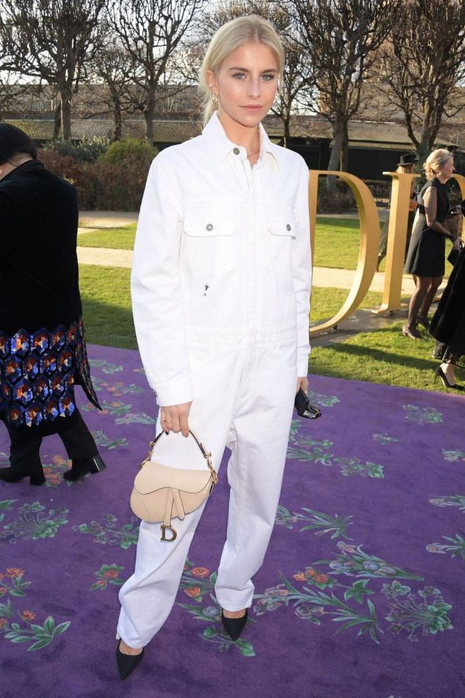 Caroline Daur carried a cream mini-version of Dior's iconic saddle bag.