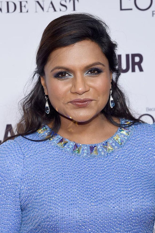 For those mornings when you are running super late to work, try Mindy's insta-glam look. Make a deep side part, clip some hair back, and run out the door. Photo: Getty