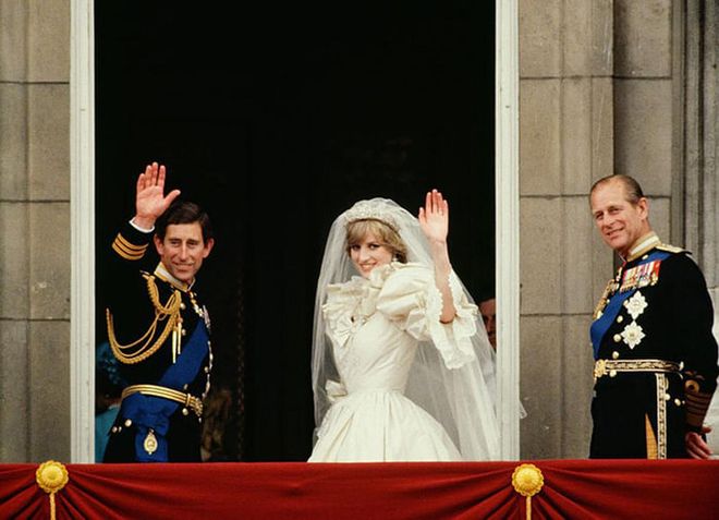 Prince Charles and Princess Diana on their wedding day, standing alongside Prince Philip.