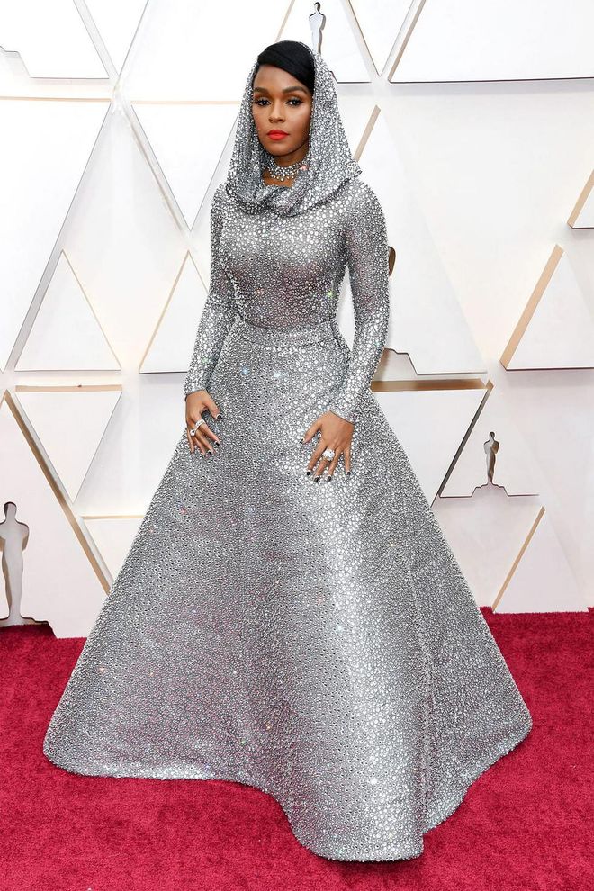 What: Ralph Lauren Collection

Why: Never one to shy from a dramatic look, Monáe brought it in a custom crystal-laquered silk lamé tulle mesh evening dress. The real pièce de résistance? A draped hood. The gown is fully hand-embroidered with over 168,000 Swarovski crystals. Photo: Getty