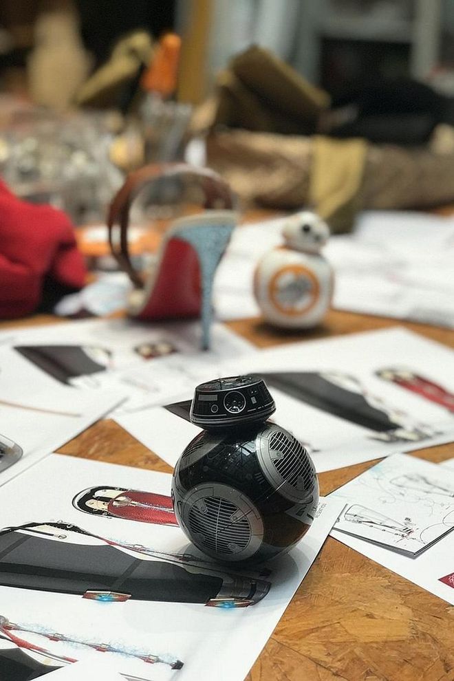 A mini BB-9E and BB-8 roll among Louboutin samples and sketches in Louboutin's design studio. Photo: Ty Ervin
