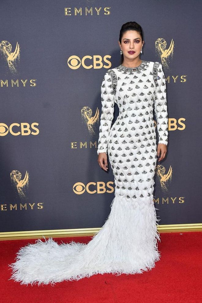 In another white feathered look, Chopra stunned in a white jewel-encrusted Balmain gown at the 2017 Emmys.

Photo: Getty