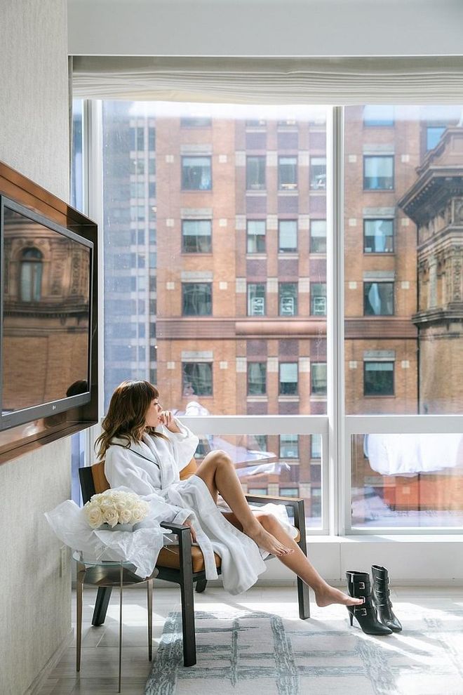 It's an early start to the day of the Michael Kors show. A contemplative moment while getting ready in my room, perhaps? Photo: Andrea Chong