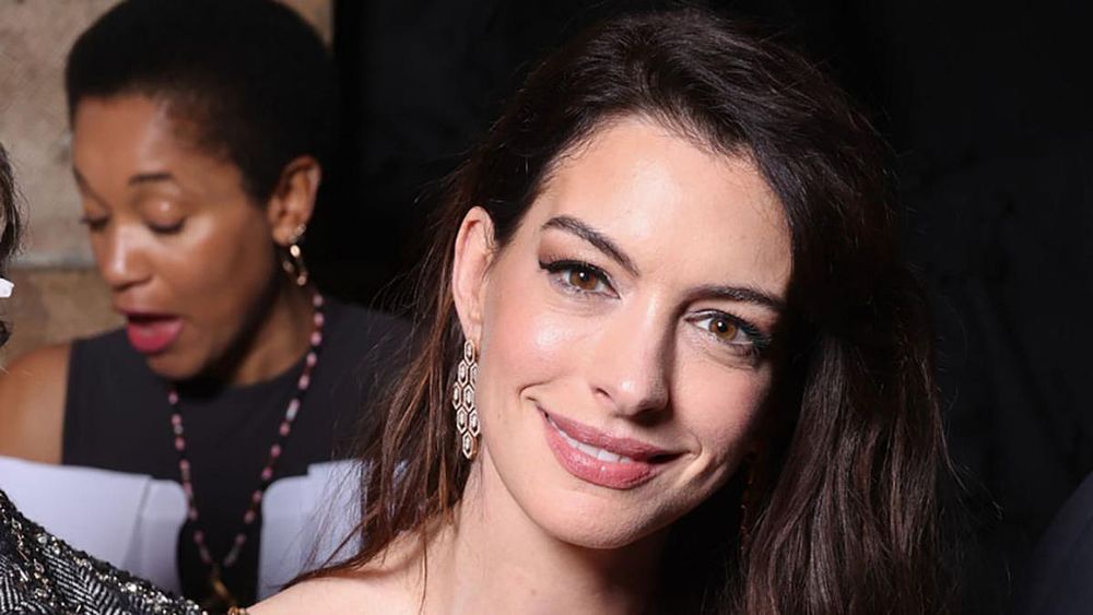 Anne Hathaway Matched Her Sequined Leopard-Print Minidress to Her Leggings