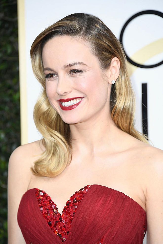 Brie Larson channeled old Hollywood with Veronica Lake-esque waves and an immaculate red lip. 

Photo: Getty Images