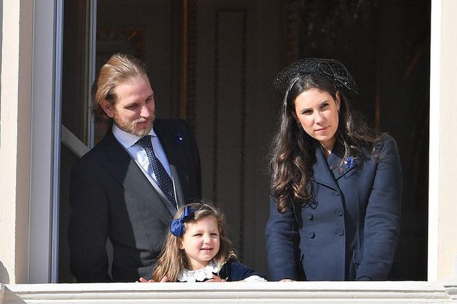 Andrea Casiraghi and his wife Tatiana watch from the balcony with their daughter India, who dressed for the occasion in a navy and lace dress and a bow.

Photo: Getty