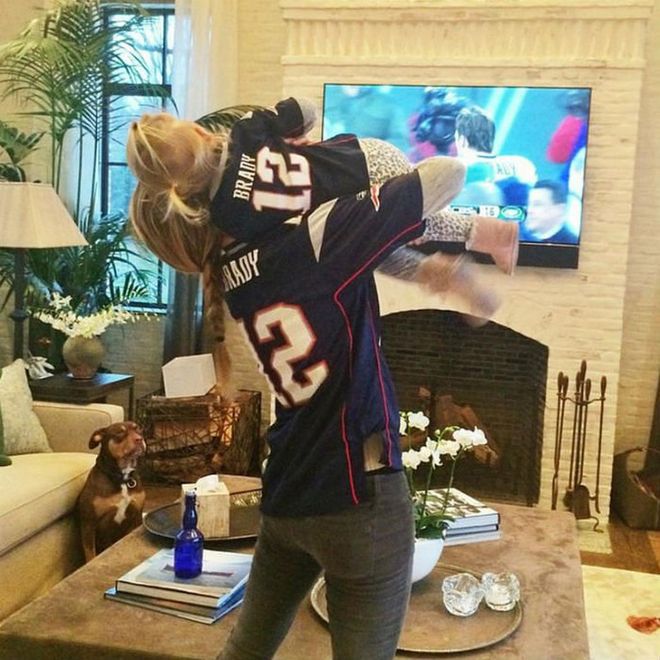 Supporting their husband and dad, Gisele and daughter Vivian both wore Tom Brady's Patriots jersey and ponytails for game day. Photo: Instagram