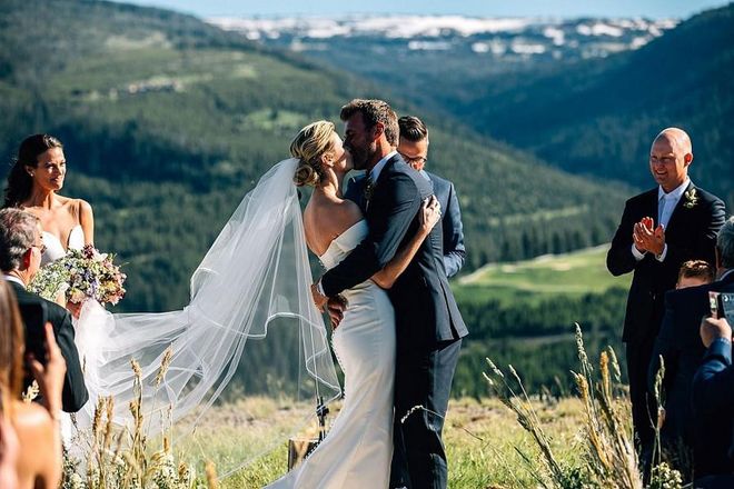 Erin Andrews wed two-time Stanley cup winner Jarret Stoll this past June in a mountaintop Montana ceremony. The couple were introduced at a football game by mutual friend, athlete and talk show host, Michael Strahan. Stoll proposed to Erin at Disney World, during a holiday visit to her family home in Tampa in 2016. The couple shared all their wedding details–including Erin's experience of designing her custom wedding gown with Carolina Herrera–with BAZAAR.com. Photo: Getty 
