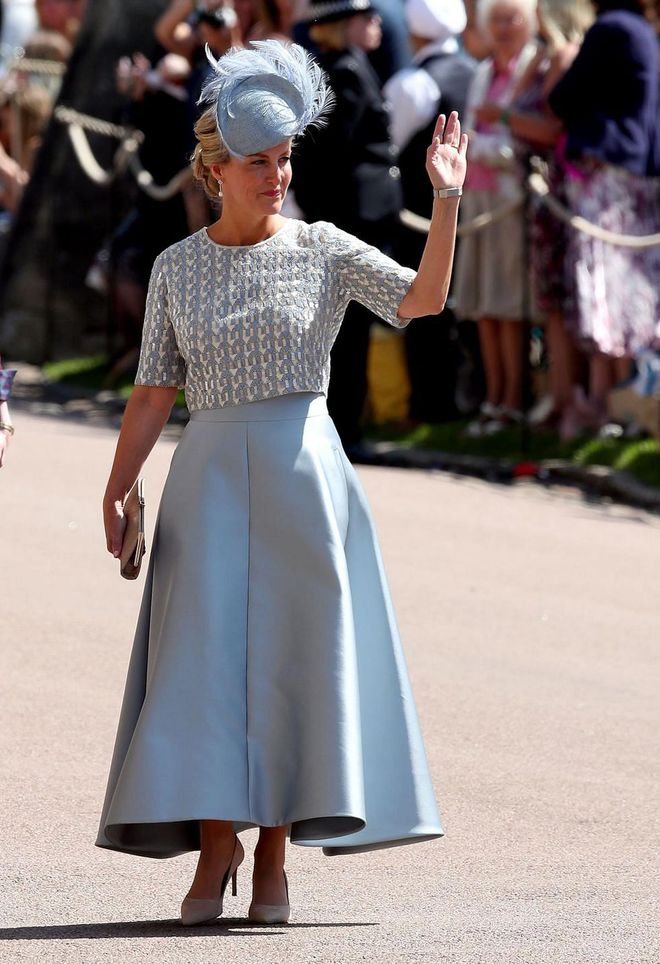 Sophie, the Countess of Wessex, in a soft blue ensemble designed by Suzannah at her nephew Prince Harry's wedding to Meghan Markle. She is also wore a hat by Jane Taylor.
Photo: Getty