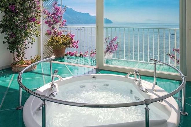 If there's anything more appealing than a sunken whirlpool bath overlooking the Amalfi Coast, we're yet to find it. Hotel Santa Caterina's Special Suites also offer a king-size bed, a master bedroom and a private garden with heated "infinity pool" on the floor below.