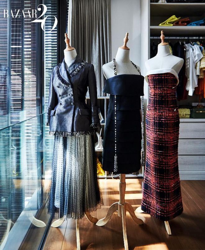 On the mannequins are (from left) a jacket and skirt from Dior Haute Couture, and a black dress and a tweed dress from Chanel Haute Couture.