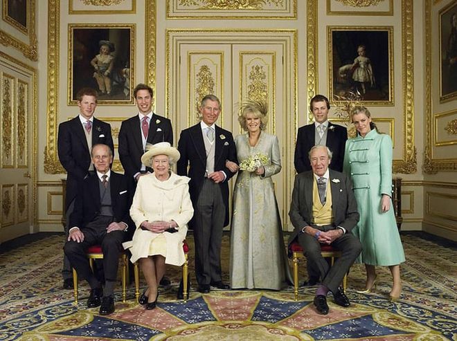 Nine years after divorcing Diana, Prince Charles remarried to Camilla Parker Bowles. The couple wed in a civil ceremony on April 8, 2005. The Queen didn't attend the nuptials, but was present at the reception afterwards.

This photo, taken at the White Drawing Room at Windsor Castle, features the married couple with Prince Harry, Prince William (the best man), Prince Philip, the Queen, Tom and Laura Parker Bowles, and Camilla's father Bruce Shand.