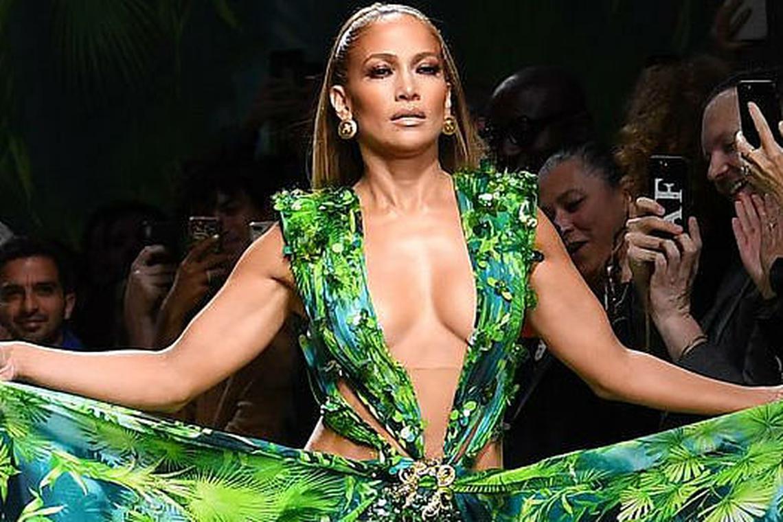 Jennifer Lopez Wore an Updated Version of Her Iconic Green Dress at the Versace  SS20 Show During Milan Fashion Week