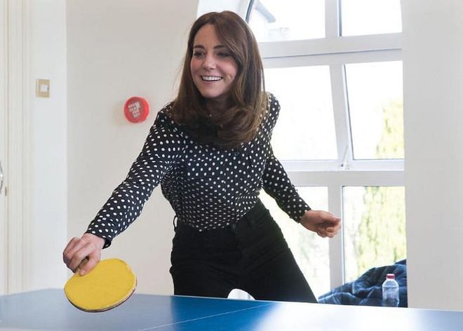 Kate tries her hand at ping-pong.

Photo: Getty