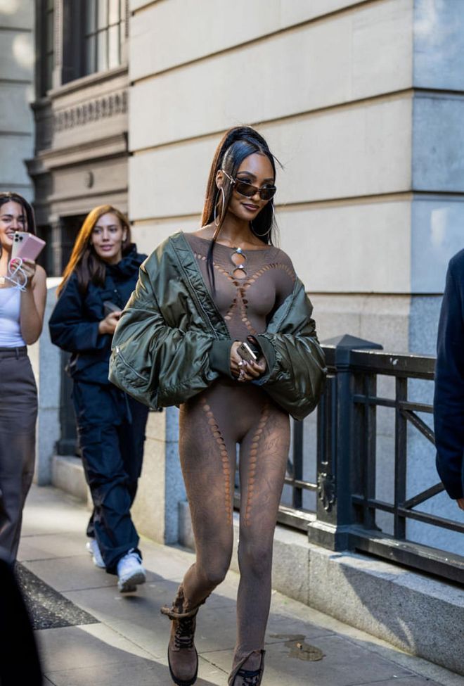 LONDON, ENGLAND - SEPTEMBER 16: Jourdan Dunn wears green bomber jacket, brown overall outside Poster Girl during London Fashion Week September 2022 on September 16, 2022 in London, England. (Photo by Christian Vierig/Getty Images)