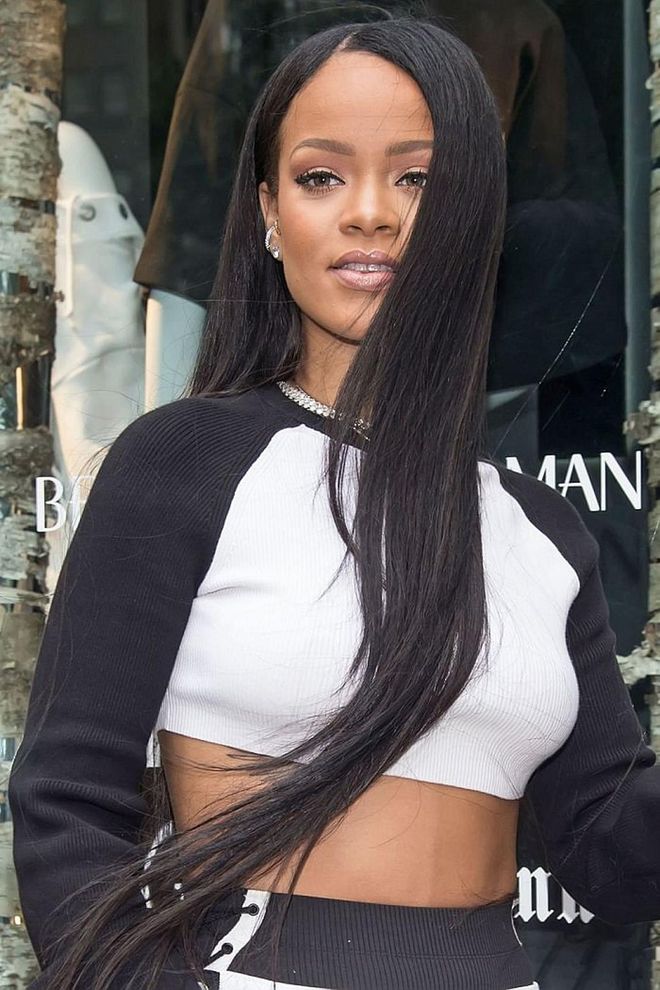 Seriously long strands give Rihanna's sporty look a girly edge. Photo: Getty