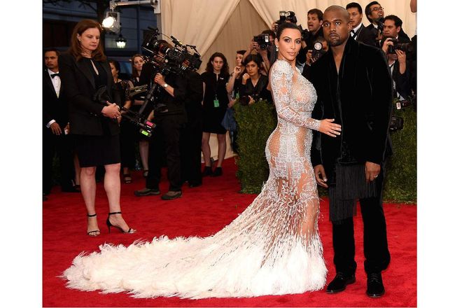Kim Kardashian wore a similar frock to Queen Bey at the 2015 Met Gala, hers in a white sequined and fur trimmed iteration by Roberto Cavalli. Photo: Getty