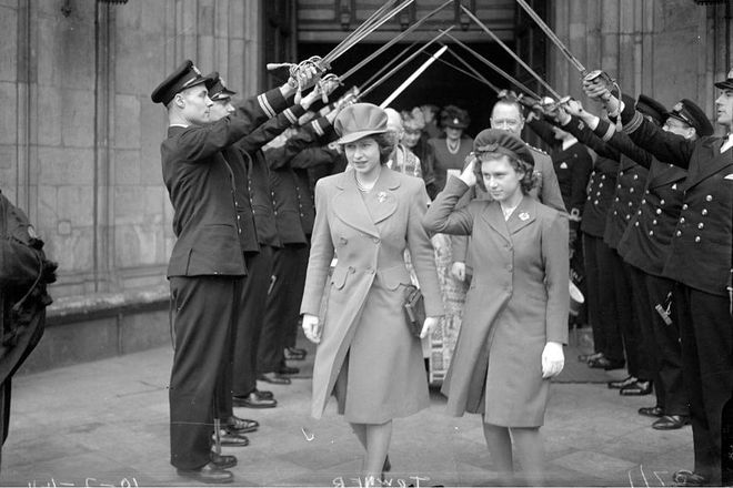 Princess Elizabeth and Princess Margaret leaving Westminster Abbey under the guard of honor, February 1944.