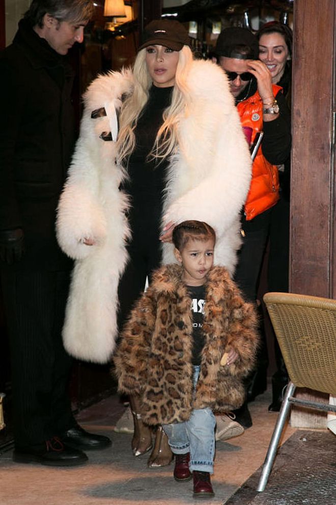 While out in New York on Valentine's Day, the tot one-upped Kim Kardashian's street style game in a leopard fur coat, cuffed jeans and Doc Martens. Photo: Getty