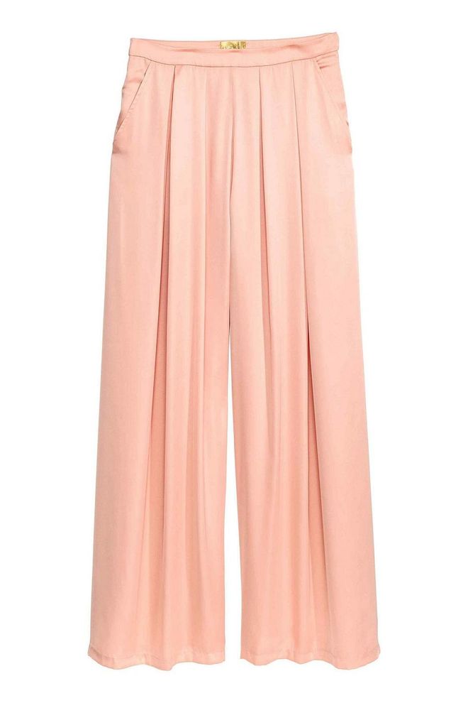Perfect for summer occasion dressing, H&M's powder pink trousers are perfect with a silk camisole.