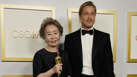 Brad Pitt Brought His Tiny Ponytail To The Oscars