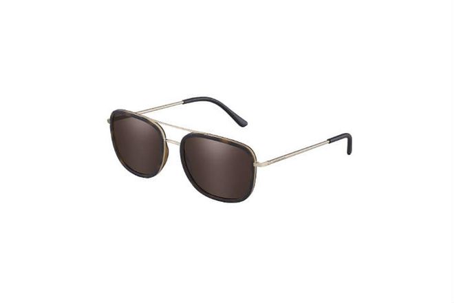 The rounded angles with metallic accents on this pair will glam up your dad's daytime ensemble effortlessly. (Photo: Luxottica)