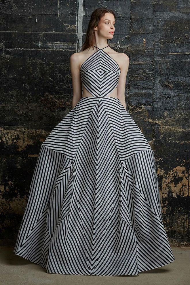 Rosie Assoulin's feminine, voluminous and sculptural evening-wear have been spotted on red carpet favourites such as Rihanna and Beyoncé.

This standout evening gown from her fall/winter 2015 collection, featuring angular lines and geometric shapes, was inspired by the Brion Cemetery by Italian architect Carlo Scarpa. 