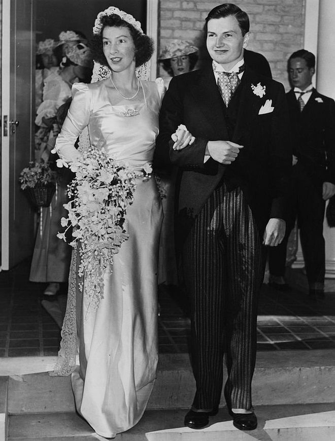 Almost ten years later in Bedford, New York in 1940, David Rockefeller (AKA the former chairman of the Chase Manhattan Bank and the Metropolitan Museum of Art) married Margaret McGrath and she wore a very similar gown—with slightly puffier sleeves. Photo: Getty 