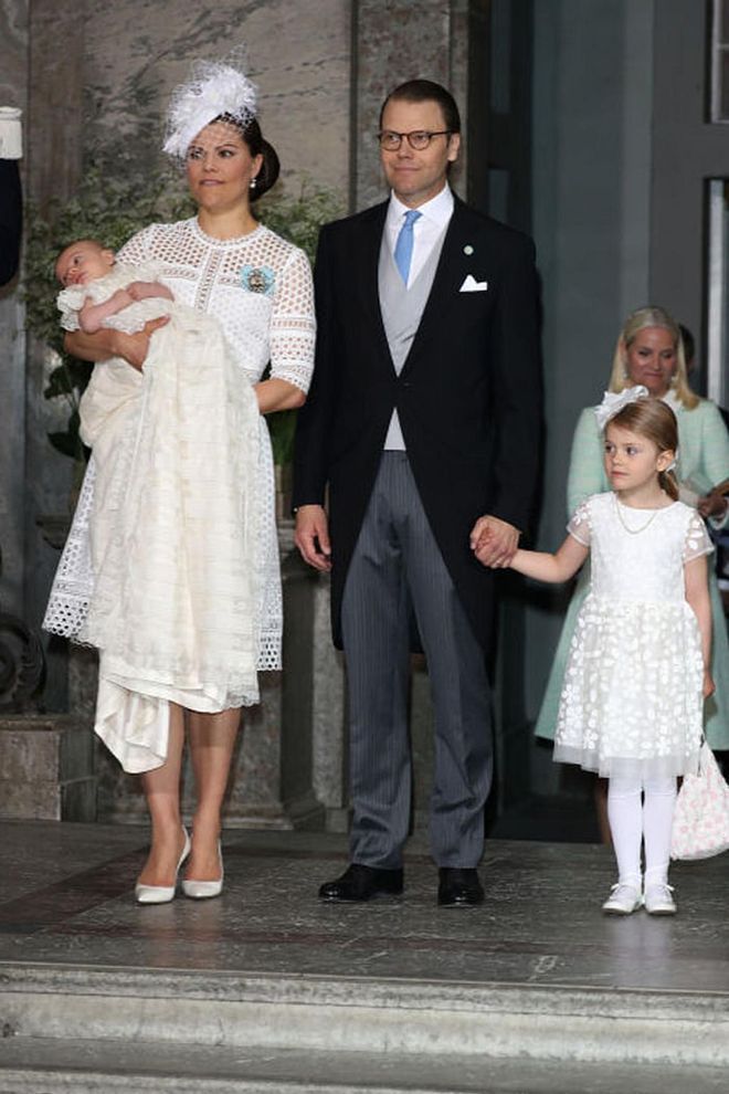 For her son Oscar's baptism, she chose a white broderie anglaise dress and matching hat and shoes. She's active in children's charities in Sweden, including her own, the Crown Princess Victoria Fund, which puts money toward recreational activities for children with chronic illness.