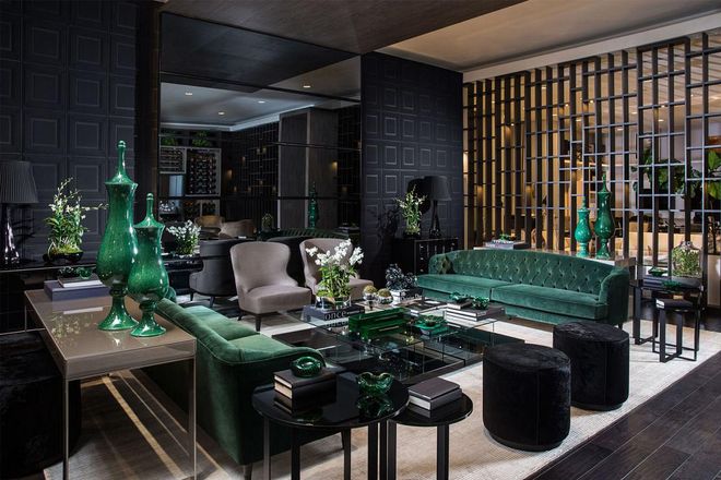 Avant Design, made up of sisters Cristina and Monica Souza, created a space around Tom Ford that epitomizes the designer's aesthetic with a rich emerald and black color palette. Added velvet pieces provide an element of luxe that is synonymous to Ford.