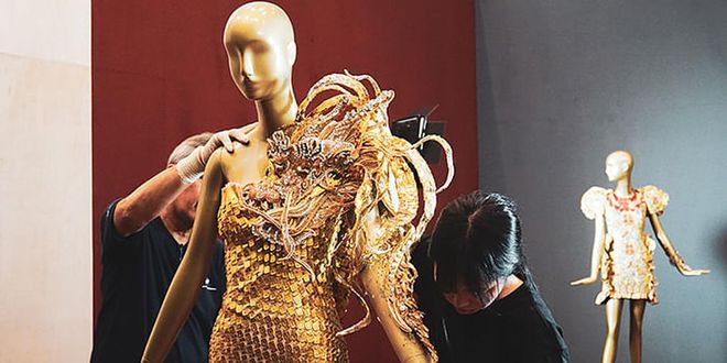 hbsg-staff-adjusting-the-gold-sequined-gown-bts