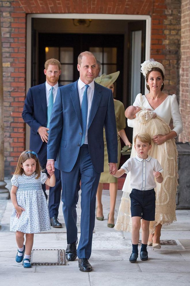 William walks hand in hand with George and Charlotte as they attend Louis' christening as a family of five.

Photo: Getty