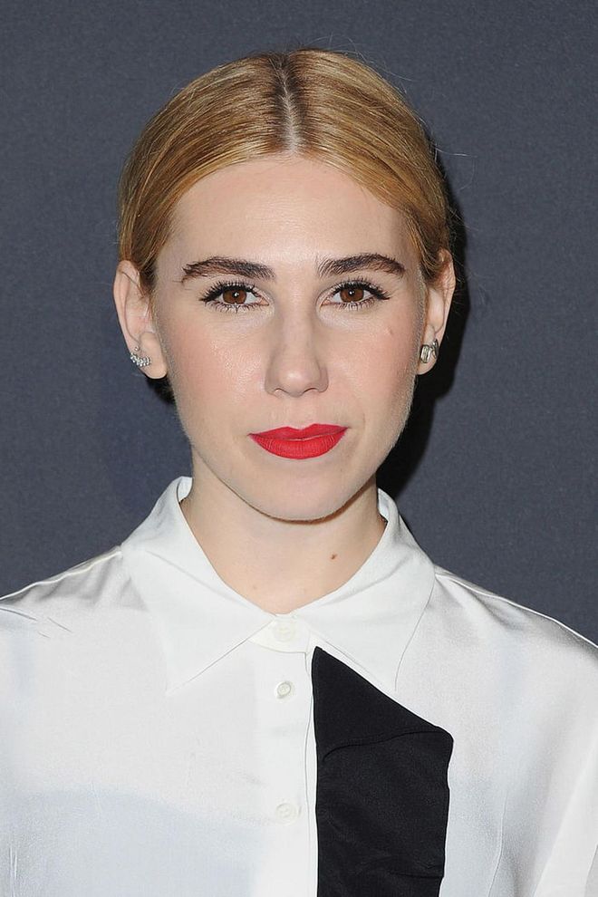 Mamet's minimalist blouse benefited from the pop of color on her lips.
