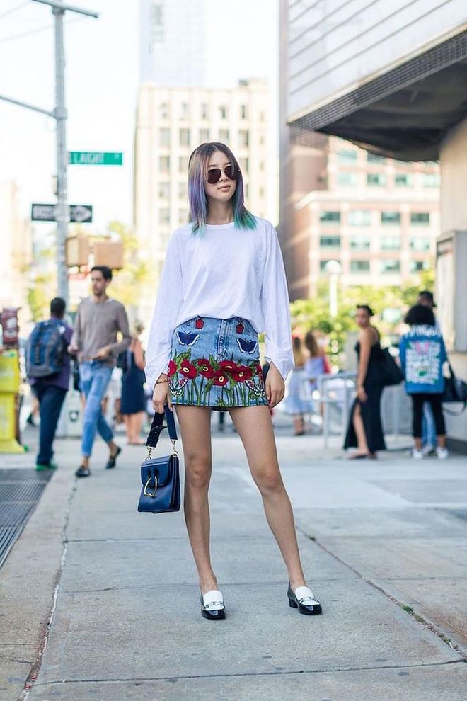 An embroidered denim mini skirt serves as the statement-making focal point of any outfit.

Photo: Diego Zuko