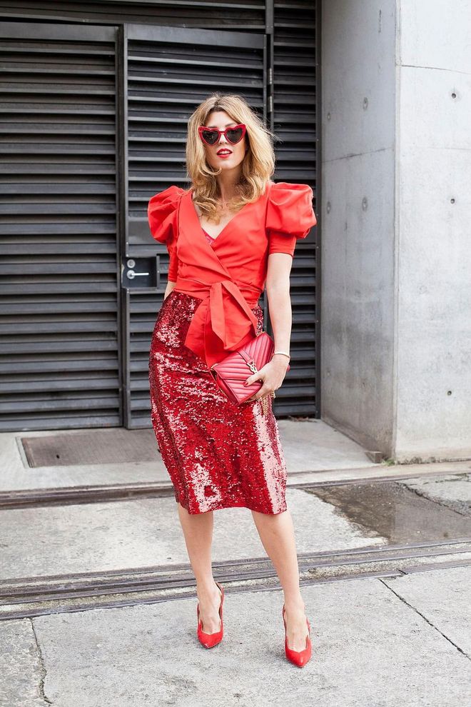 Fashion Blogger Tania Gesick is wearing a Kate Sylvester dress, Kate Spade top, Christian Louboutin shoes and YSL bag and sunglasses. Photo: Getty