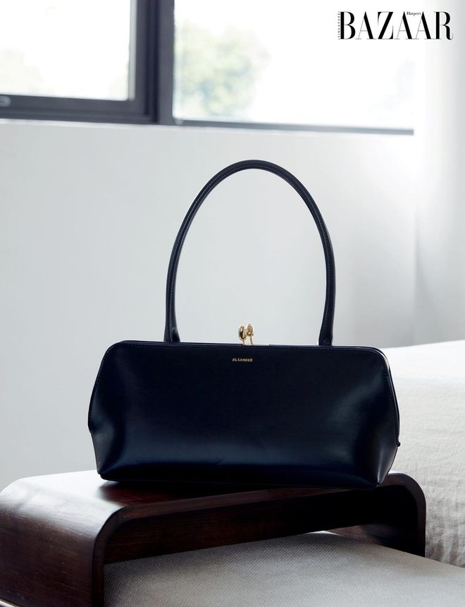 Her Jil Sander bag epitomises her minimalist style.