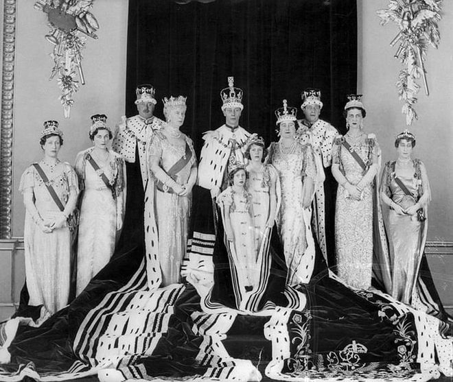 The immediate royal family poses for an official portrait celebrating the coronation of King George VI, Elizabeth II's father. The picture was taken by Hay Wrightson at Buckingham Palace.

Back row, from left to right: Mary, the Princess Royal, the Duchess of Gloucester, the Duke of Gloucester, Queen Mary, King George VI, Queen Elizabeth, the Duke of Kent, the Duchess of Kent, and the Queen of Norway.

Front row: Princess Margaret and Princess Elizabeth (who would later become Queen Elizabeth II).