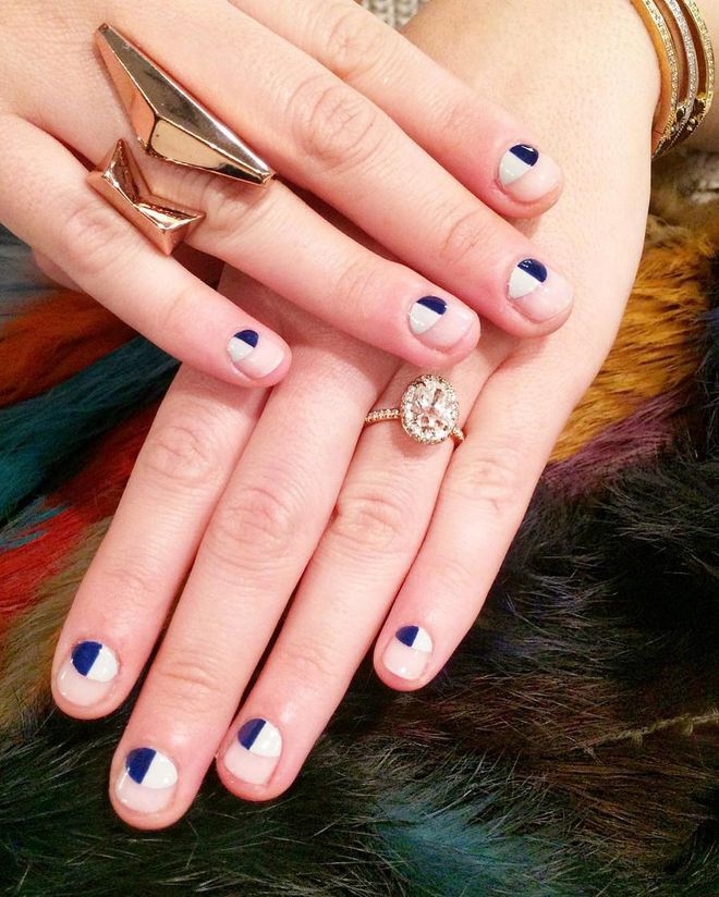 The top half of this manicure is as traditional as can be. The same can't be said for the bottom half—but hey, at least it's blue. Photo: @purplenailbox