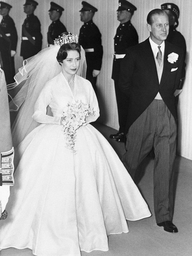 Prince Philip also gave away his sister-in-law, Princess Margaret, at her wedding to Antony Armstrong-Jones at Westminister Abbey. The ceremony took place in 1960, eight years after her and Elizabeth's father King George VI passed away. In his absence, Philip stepped in to accompany the bride for her entrance.

Photo: Getty