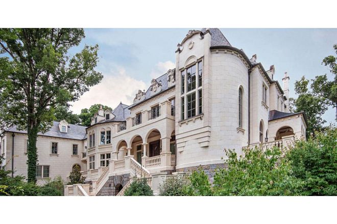 Asking Price: $10.7 million
If living in a castle sounds great except for the whole maintaining a reeeally old building thing, this house that was only built in 2006 might be more your style. It comes with a massive indoor pool, a wine tasting room, and a home theatre.